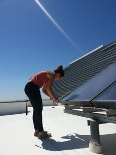 On the roof of the Geology Building at the University of Utah creating a fake rain event over a solar panel roof surface
